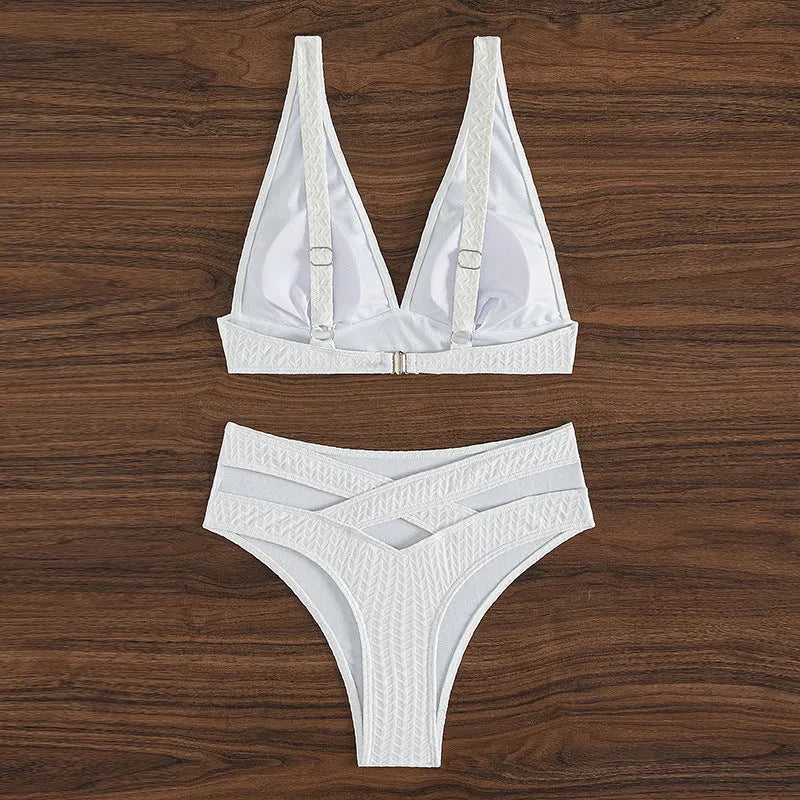 White solid colour backless bikini swimsuit for women on a mannequin