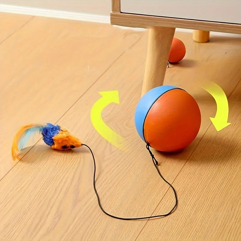 Interactive cat toy with orange rotating ball on grey plush mouse base, showing 8.5cm diameter