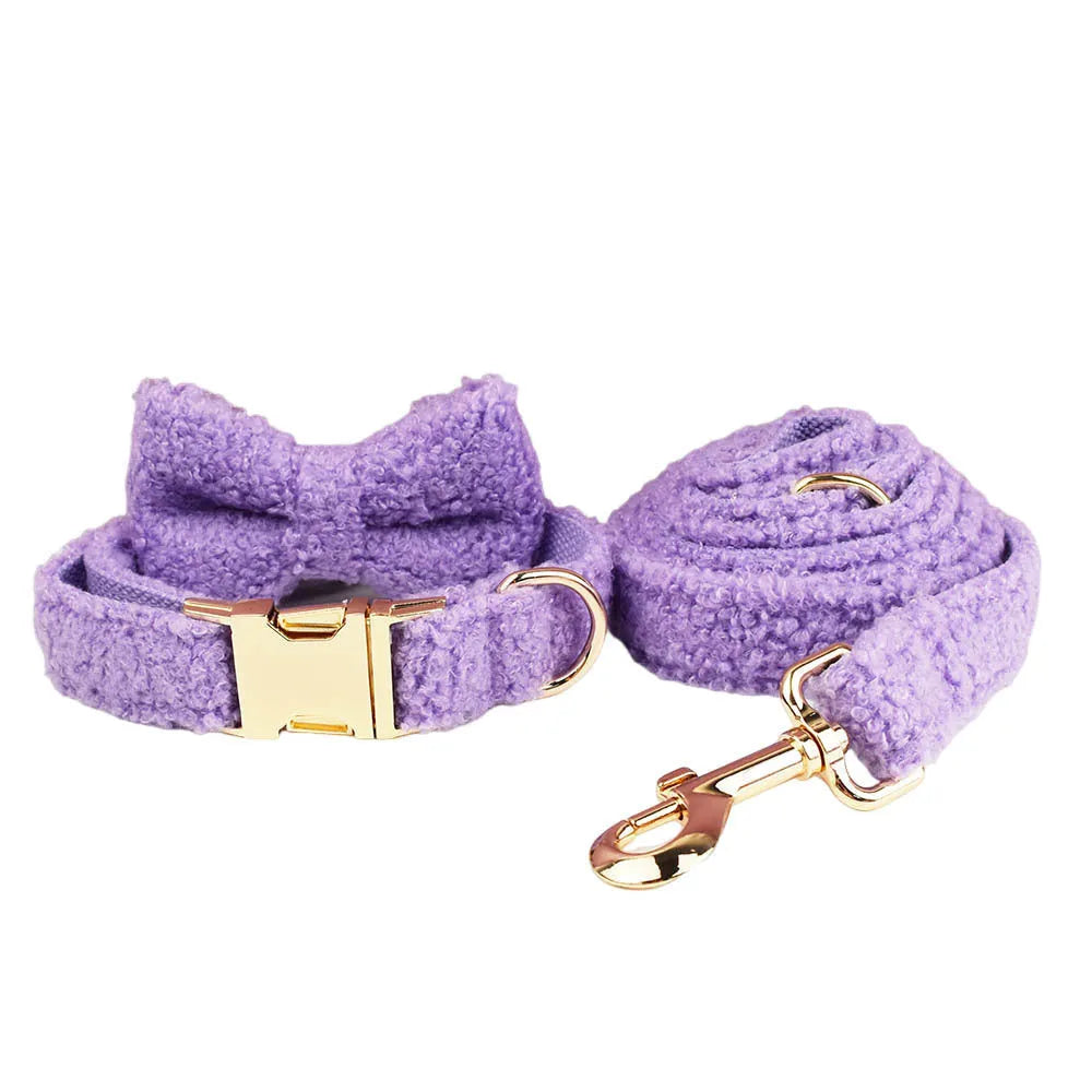 Four-piece cloth dog set showing collar, leash, bow, and vest for small to extra large dogs