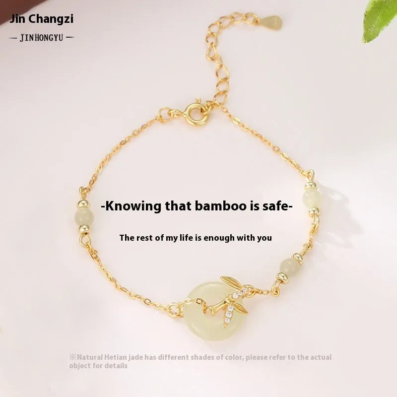 Women's Hetian jade bracelet with Peace Buckle clasp in antique style, made from 925 silver