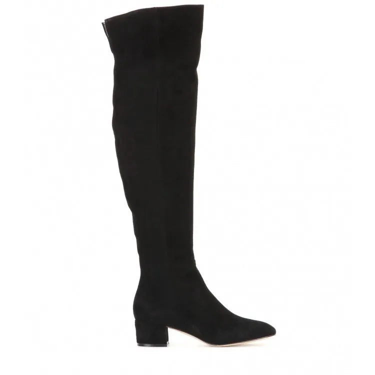 Women's grey suede over-the-knee flat boots with low heel and pointed toe on a neutral background