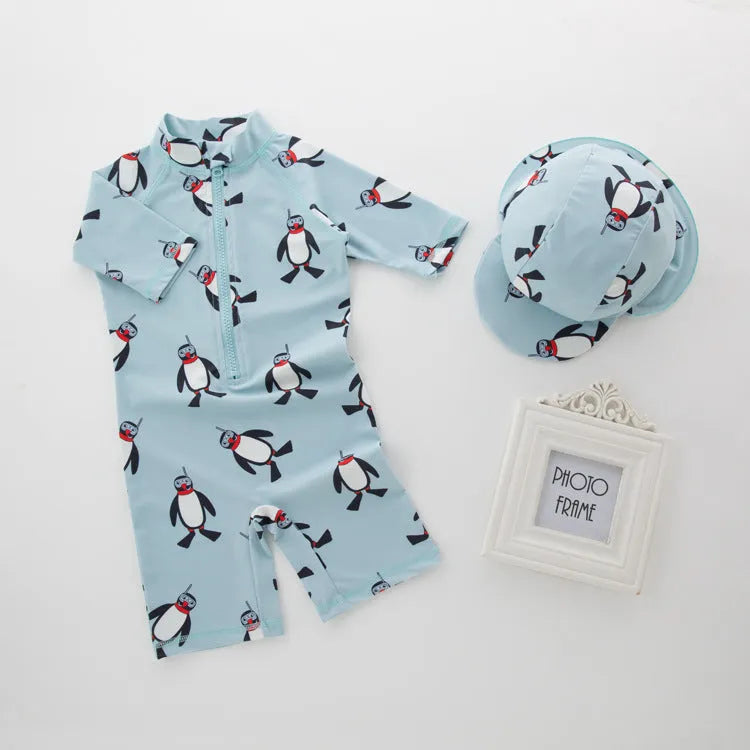 Boy's penguin print long sleeve swimsuit with matching swimming cap for beach sun protection