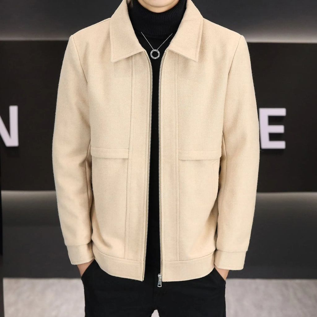 A man's khaki casual jacket with a polo collar and side seam pockets.