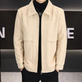 A man's khaki casual jacket with a polo collar and side seam pockets.