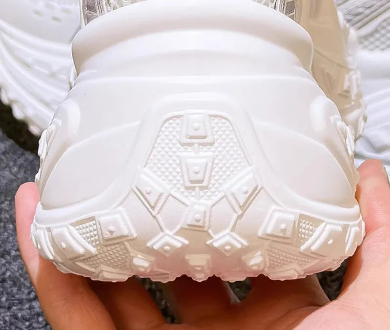 White women's lace-up dad shoes with a round toe and PU leather upper, featuring a hidden height increasing insole.