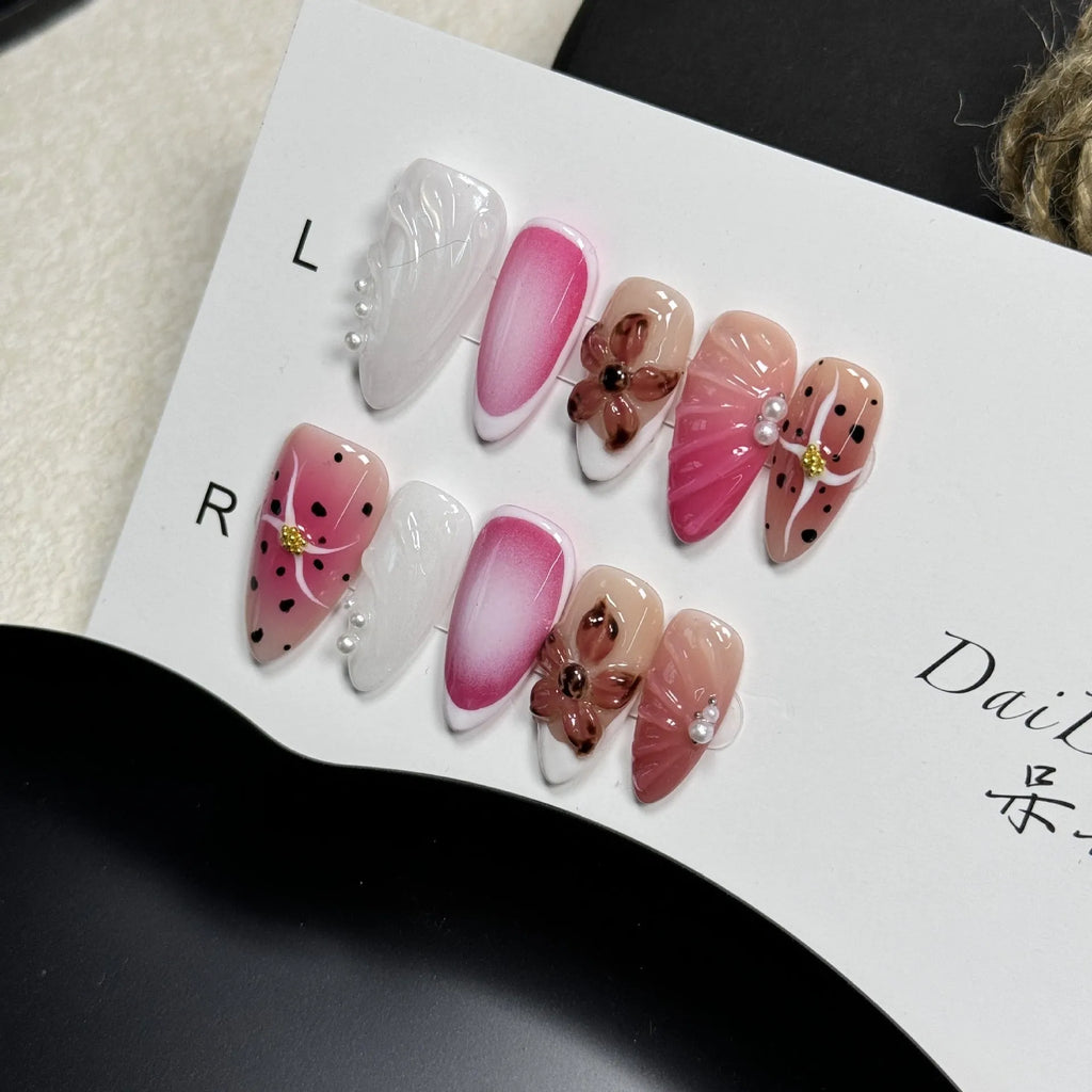 Hand-painted three-dimensional nail patches with embossed candy patterns in almond shape