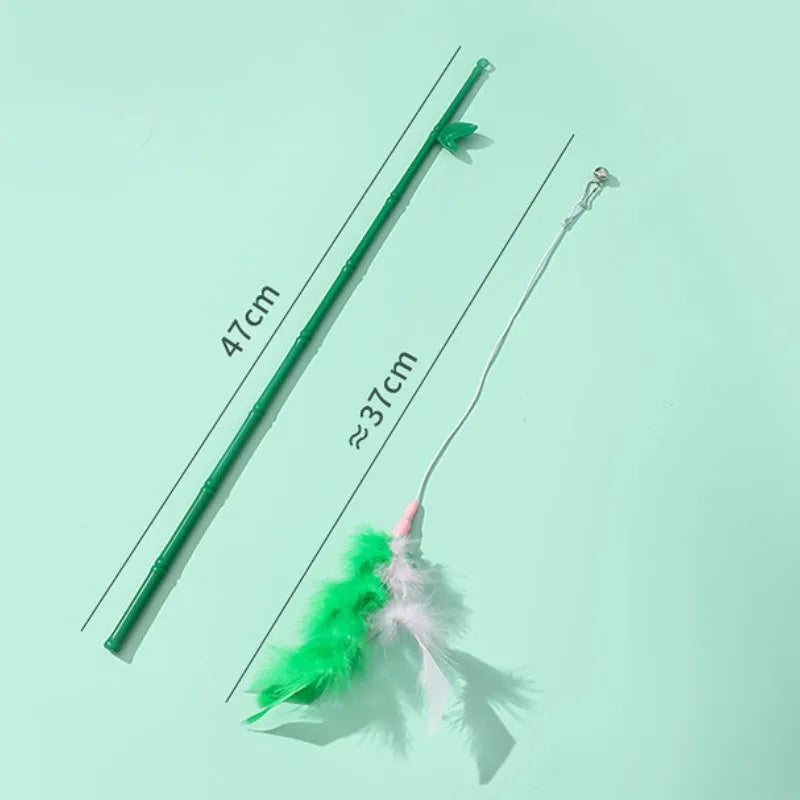 Green interactive cat wand toy with feather and bell attachments for stimulating play