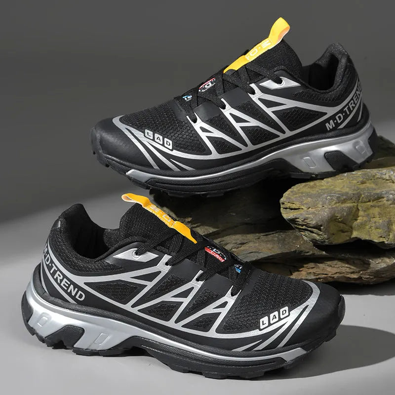 Low-top hiking shoes with mesh lining and rubber soles in khaki colour with front lace-up design