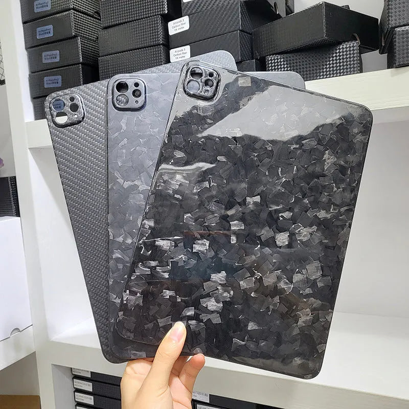 Carbon fibre flat protective cover for iPad Pro 11 showing embossed plaid pattern and precise port cutouts