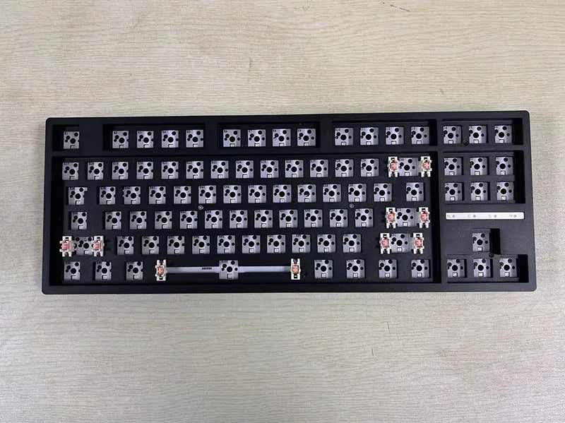 DIY mechanical keyboard kit with hot-swappable seat in multiple colour options including black, white, pink, and transparent cases