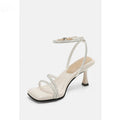 Women's silver rhinestone high heel sandals with buckle ankle strap and square toe