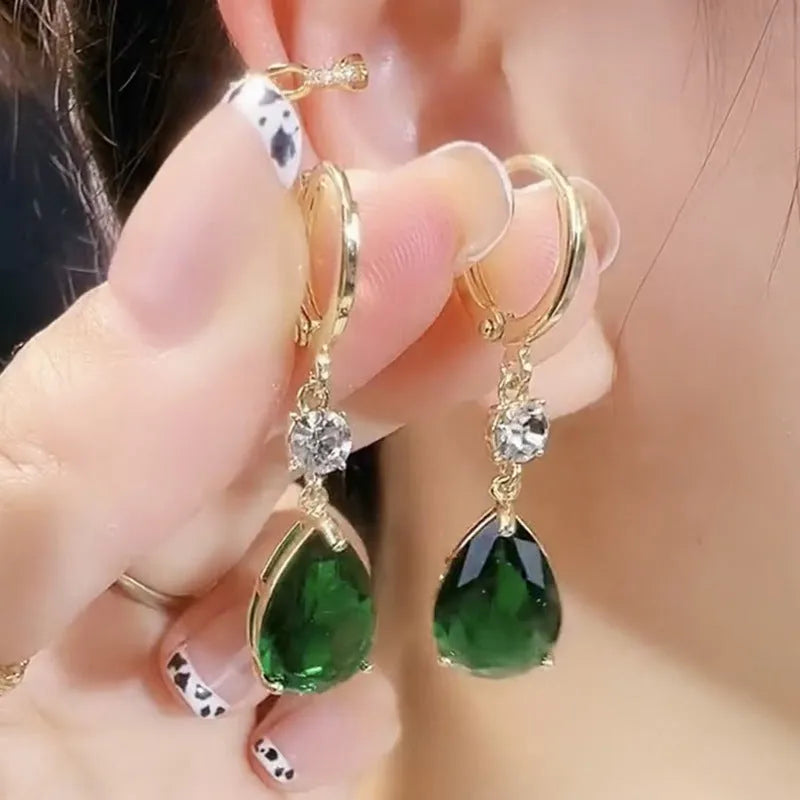 Geometric teardrop earrings in green colour with alloy construction, measuring 3 cm in length