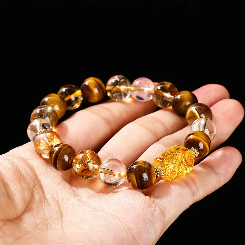 Yellow tiger's eye and citrine bracelet with 10mm round beads, pi xiu charm, and steel fittings