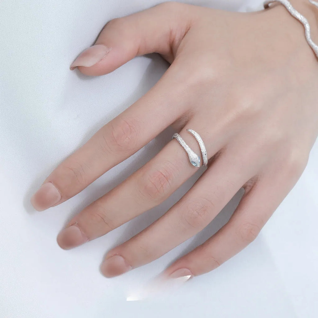 Adjustable silver snake ring with electroplated platinum colour finish and detailed scale texture