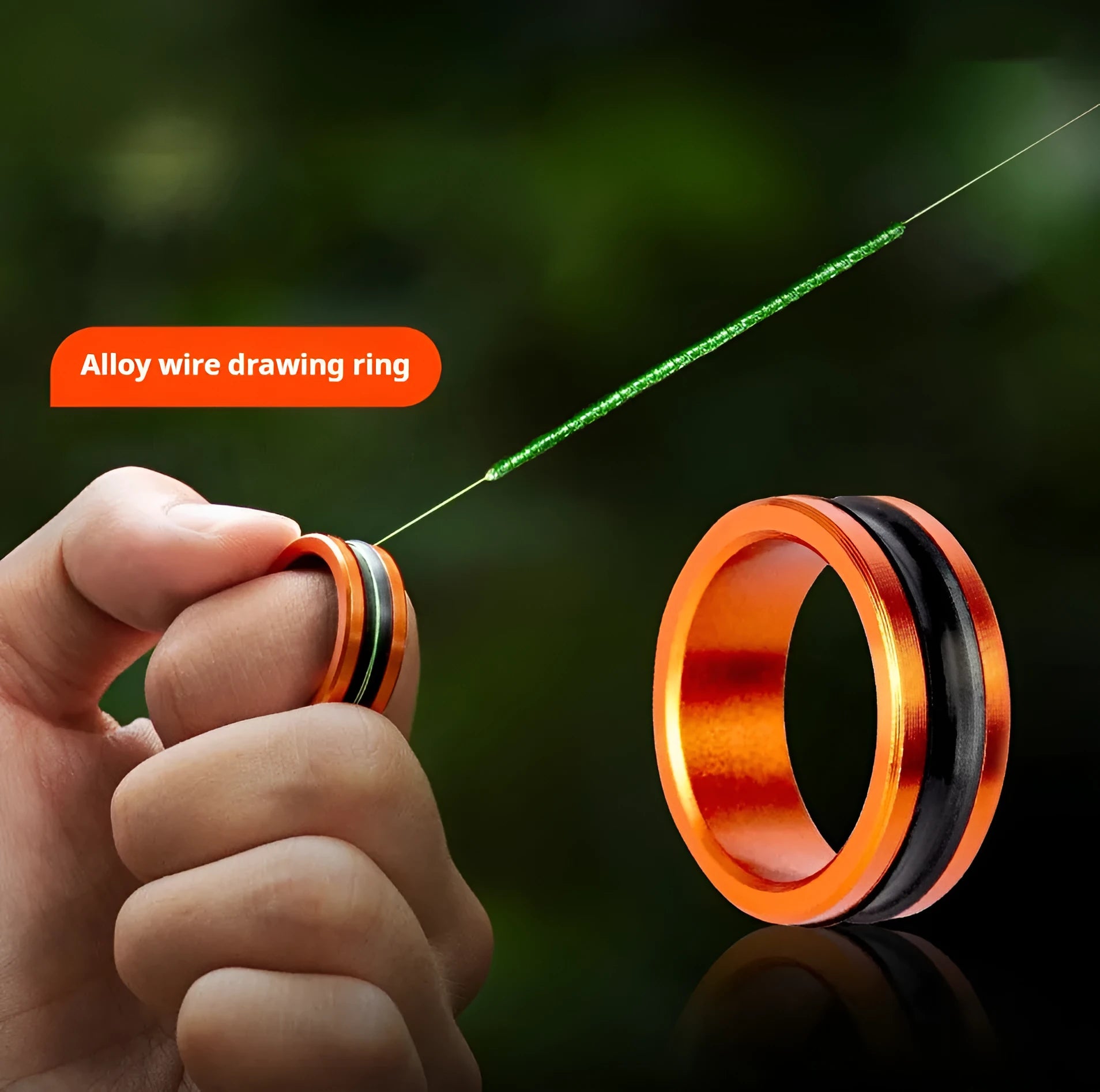 Alloy fishing hand guard tool with non-slip pull loop in orange and silver colour options