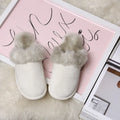 Pair of couple wool slippers with suede upper and non-slip TPR sole in beige