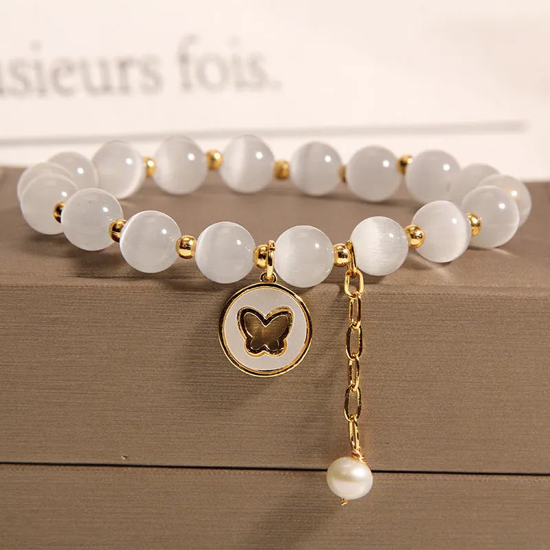 White geometric crystal cat's eye bracelet with adjustable closure in Korean health care style