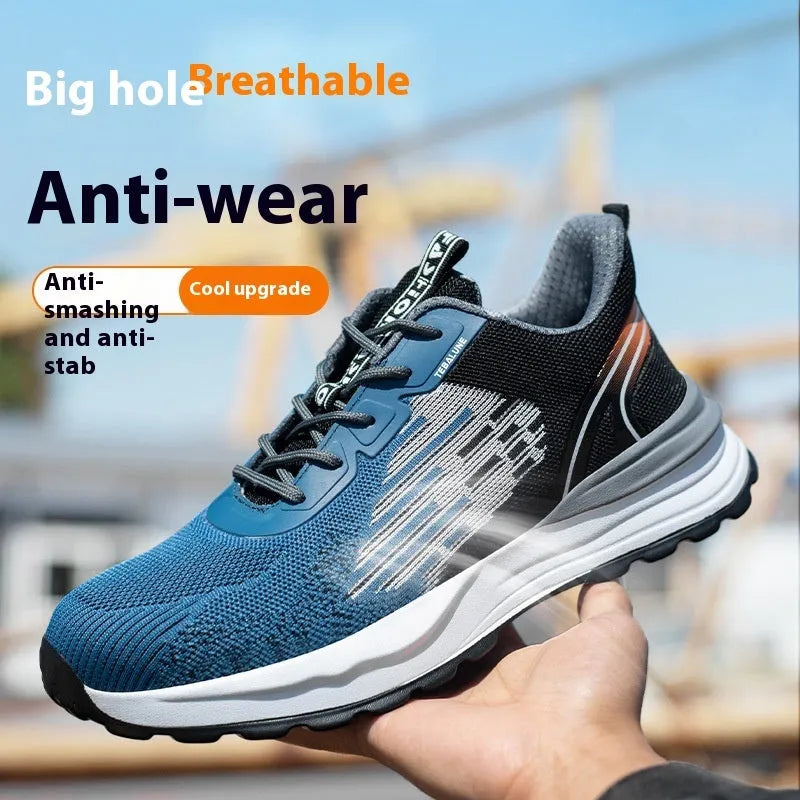 Blue men's safety work shoes with mesh upper, plastic toe cap, and lace closure on a grey background.