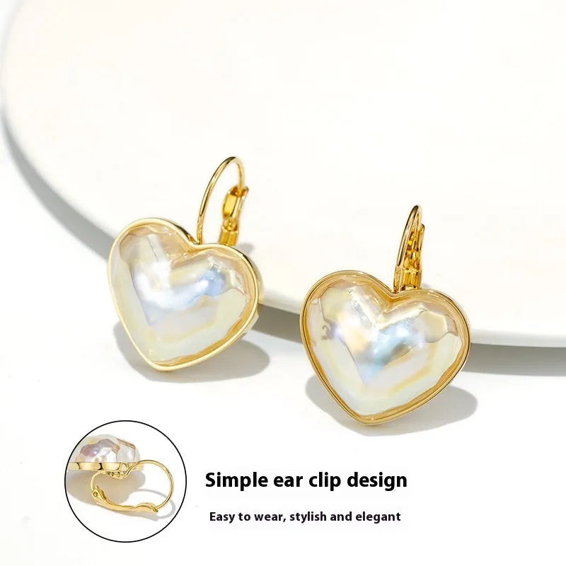 Gold coloured summer love design alloy ear clips for women.