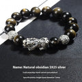 Men's geometric obsidian bracelet in sterling silver showing polished finish and natural stone detailing