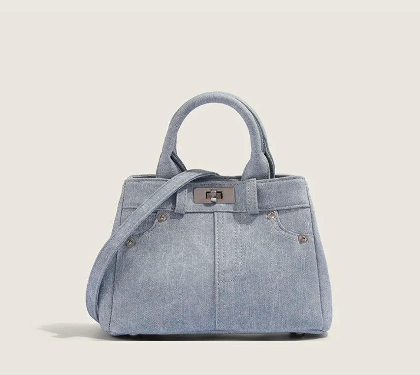 Women's casual shoulder bag in denim blue or white colour made from soft PU material