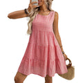 Women's loose fit sleeveless plaid dress with an oversized swing skirt in light blue.