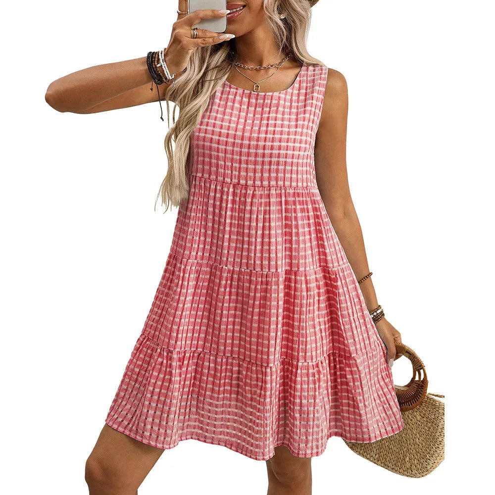 Women's loose fit sleeveless plaid dress with an oversized swing skirt in light blue.