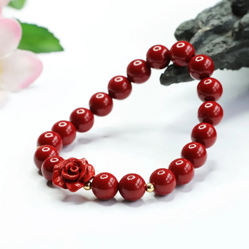 Purple gold sandstone cinnabar bracelet with 8mm rose-carved beads on wrist
