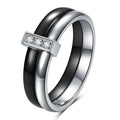 Geometric ceramic ring with zirconium inlay, available in steel black or gold white, sizes 6 to 10