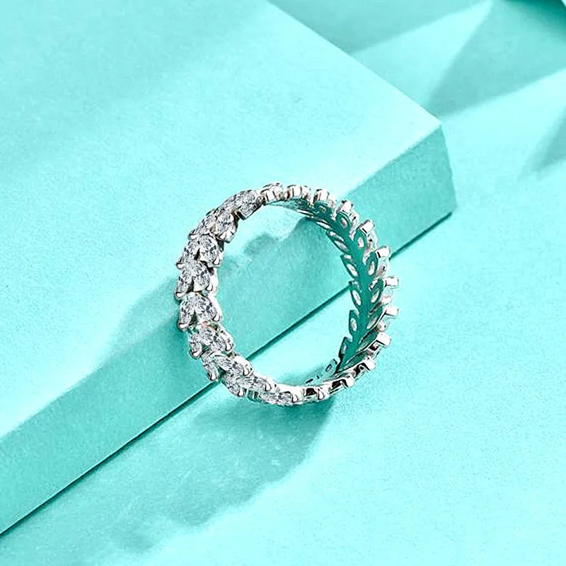 Silver closed ring for women with inlaid zircon stone, leaf shape and wheat detail in white gold colour, sizes 6 to 9