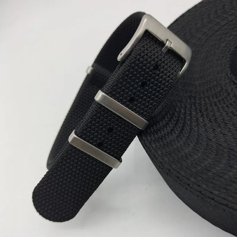 Nylon integrated watch strap showing textile construction in Army Green colour with standard buckle