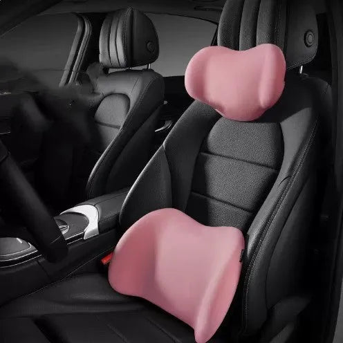 Car headrest and waist cushion set in memory cotton, shown in black colour on a car seat