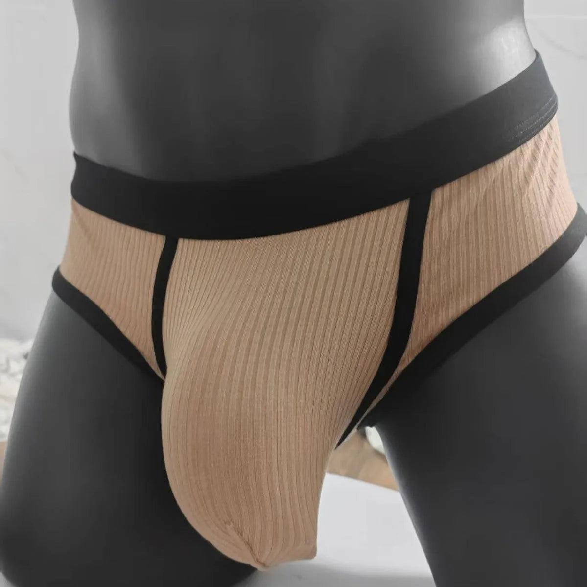 Men's solid colour briefs in viscose fabric with U-shaped design and low waist construction