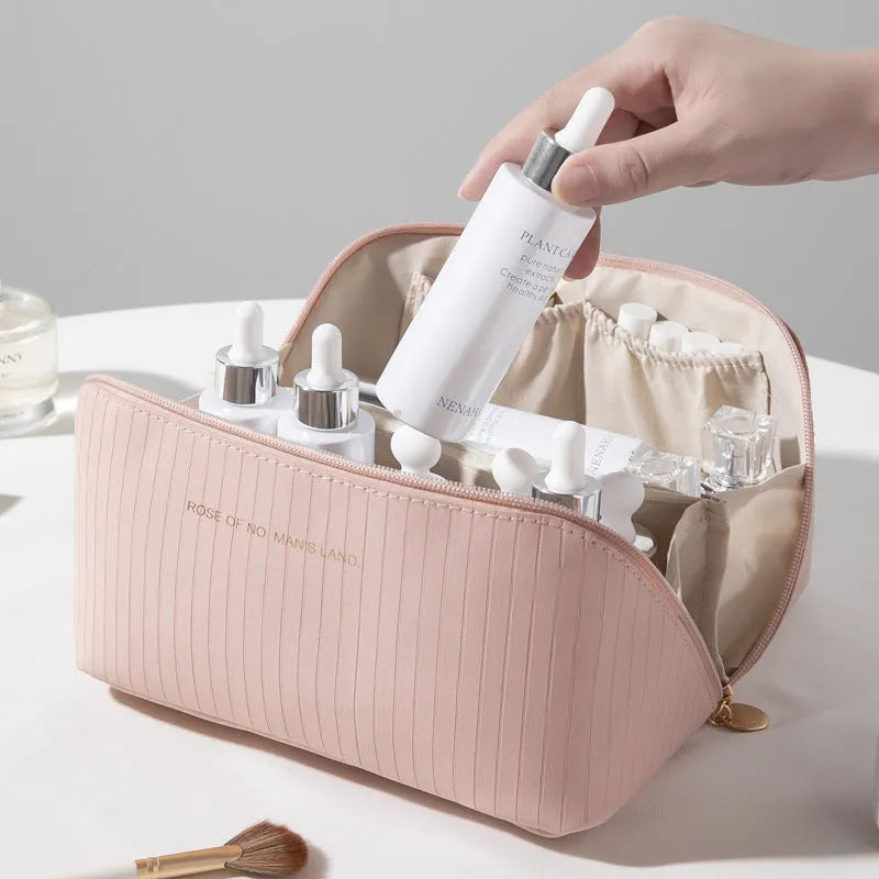 Beige cubic makeup bag with vertical pattern design showing 22.5cm height, 12.5cm width dimensions