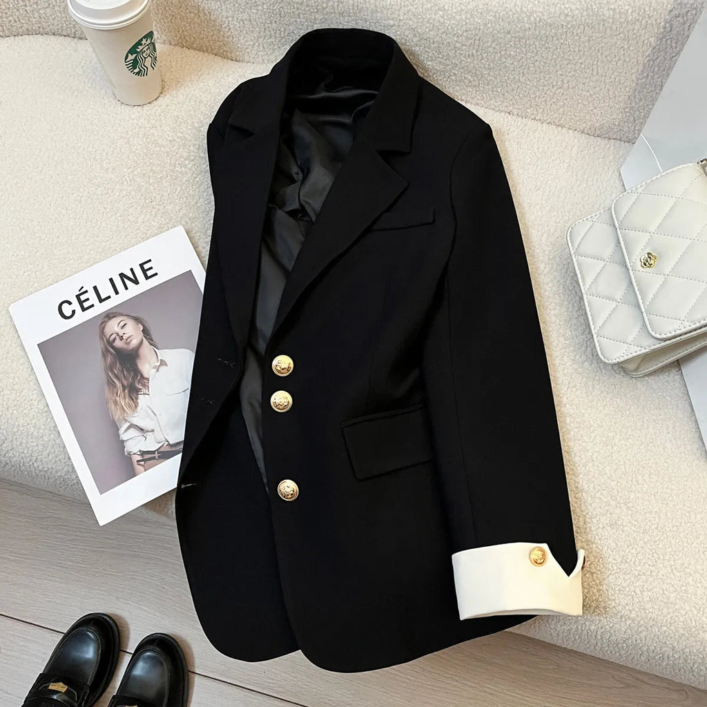 Women's Korean-style coat in solid colour with loose fit, 65cm length, and pockets for commuting wear.