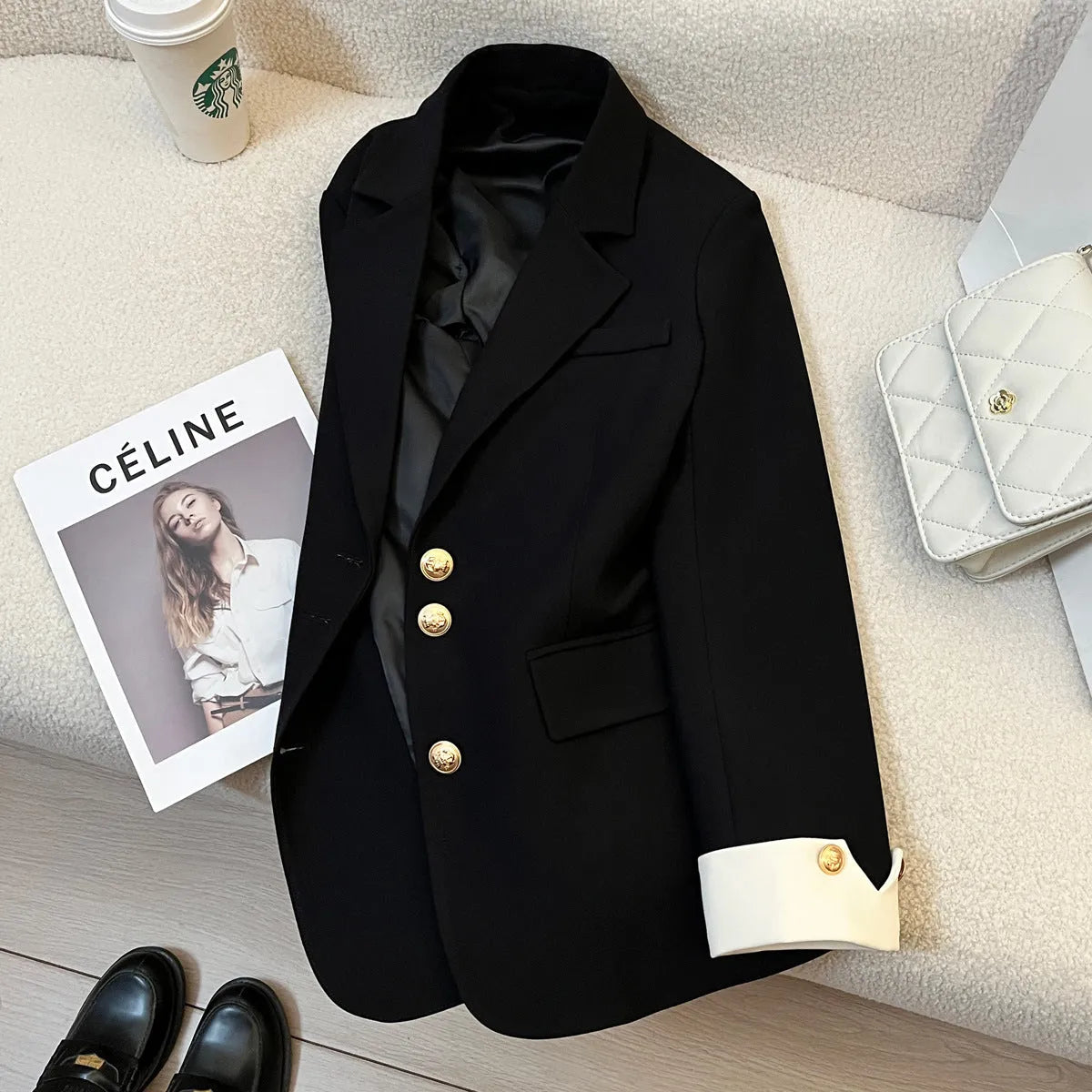 Women's Korean-style coat in solid colour with loose fit, 65cm length, and pockets for commuting wear.