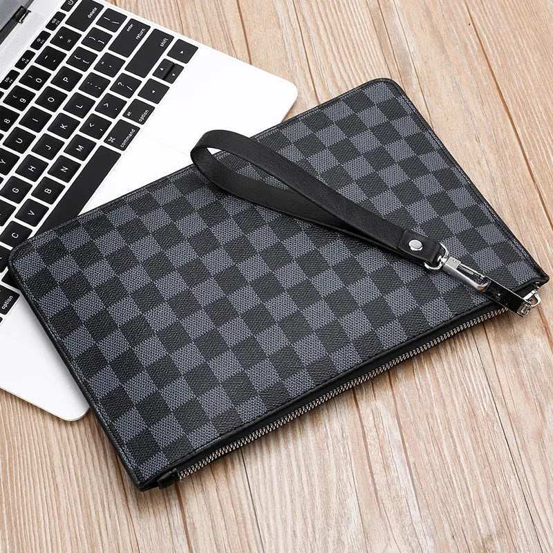 Men's black PU leather clutch with six card slots, measuring 18cm by 28cm, on a table
