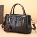 Large capacity shoulder bag with urban simplicity style, showing internal zipper compartments and contrasting sewing thread details