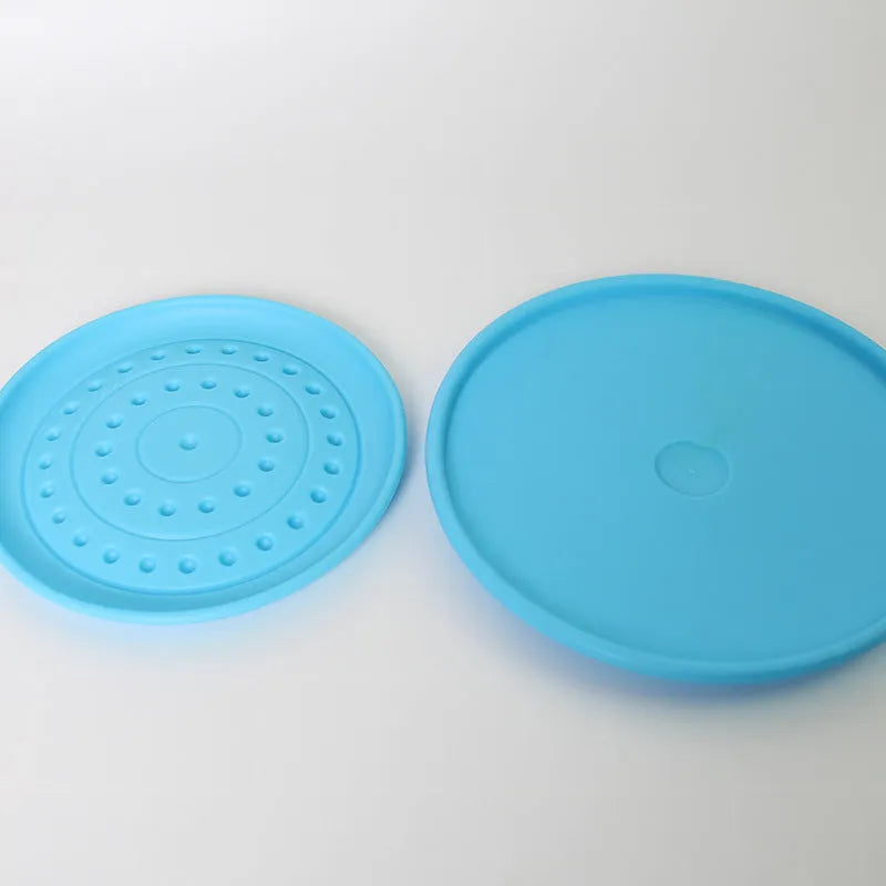 Plastic rubber dog frisbee toy in multiple colour options for outdoor fetch games