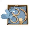 Baby teething toy gift set with bamboo fibre blanket, wooden teether, woven bell, and developmental toys for infants