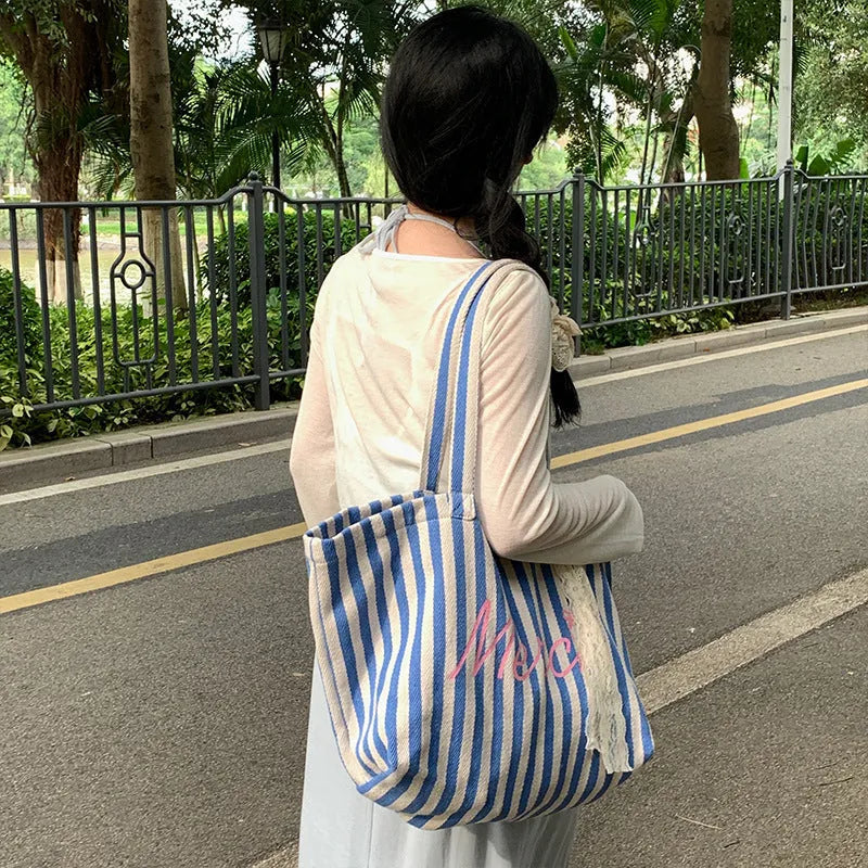 Blue striped letters printed cotton canvas bag with pink, blue and white striped design