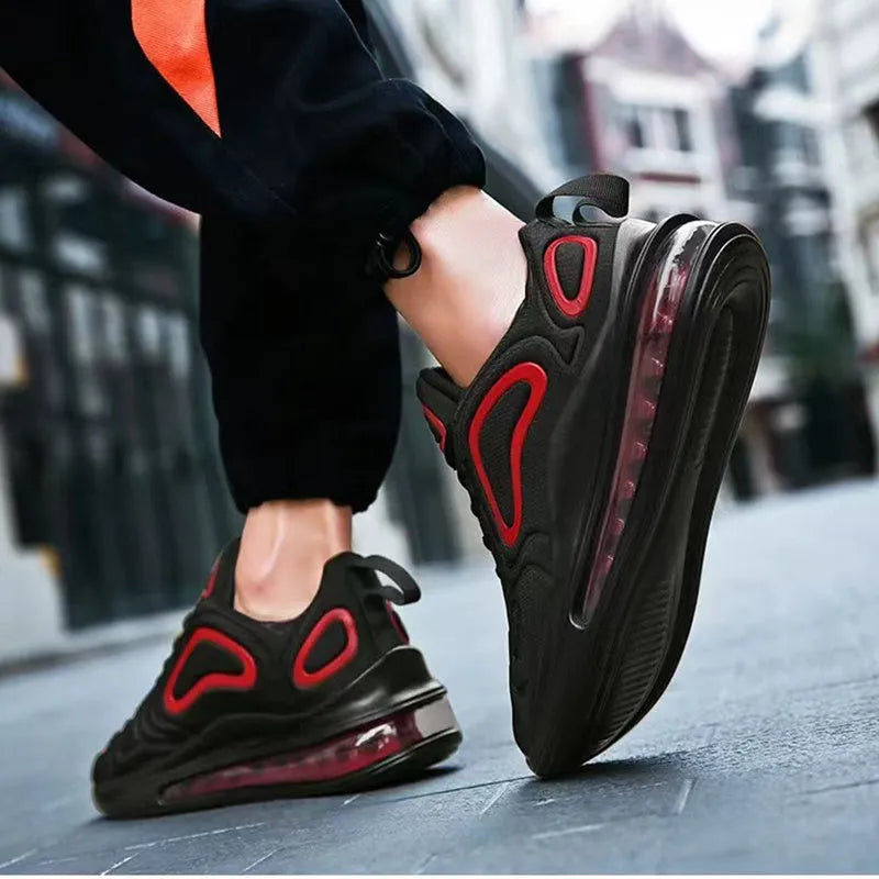 Men's black casual sneakers with a thick sole and lace-up front on a white background.