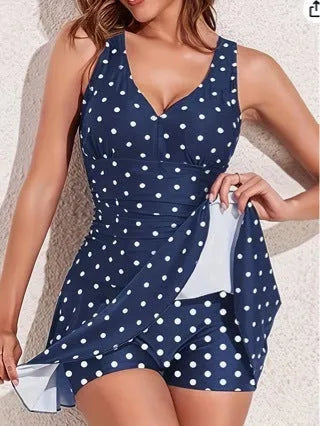 Women's blue polka dot plus size bikini with skirted briefs and matching top