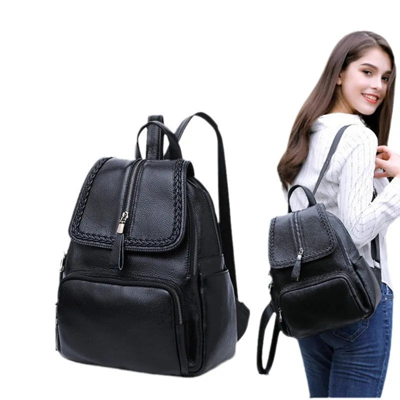 Solid colour genuine leather women's backpack showing blue exterior with multiple compartments and internal organisation