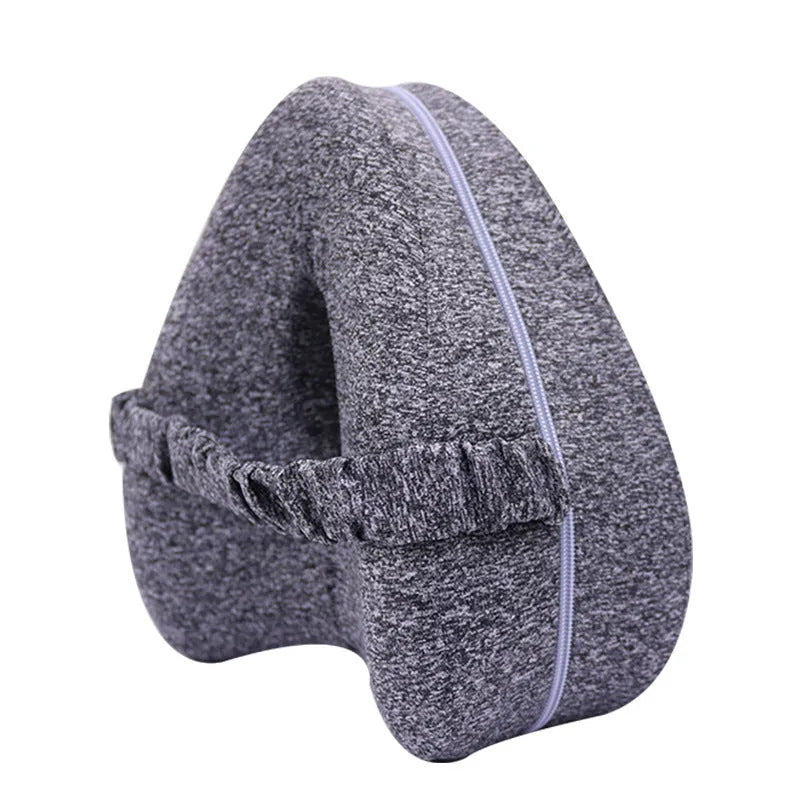 Heart-shaped memory foam leg pillow in dark blue jacquard, measuring 25x23x13cm, for adult leg support