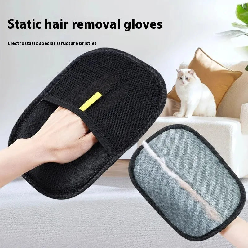 Black pet hair remover glove with soft silicone bristles on a hand, showing the dual-sided design.