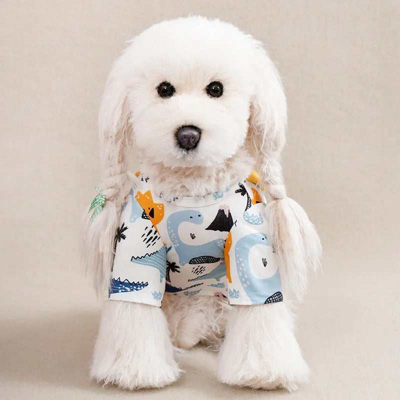 Small dog wearing full printed polyester T-shirt in spring setting