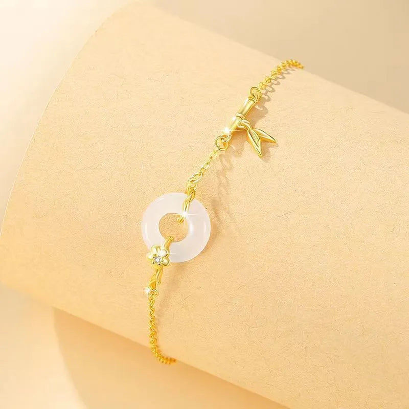 Silver-gold women's bracelet with peace buckle design, white chalcedony stone and starry sky decorations