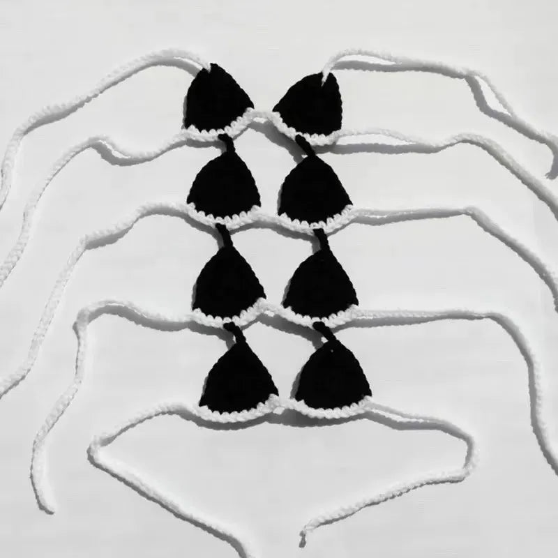 Cat wearing a polyester bikini costume in multiple colour options for Halloween or festival events