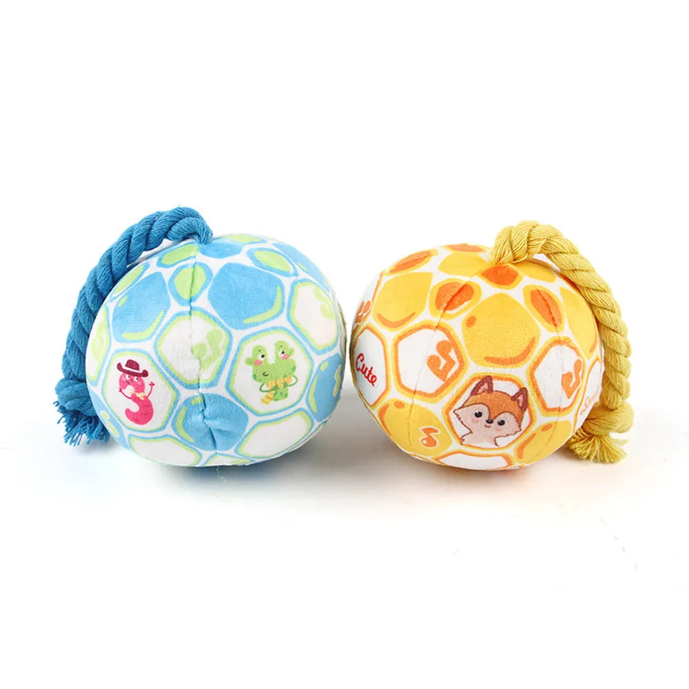Blue and yellow elastic football dog toy made from cotton rope for tug of war and teeth grinding.
